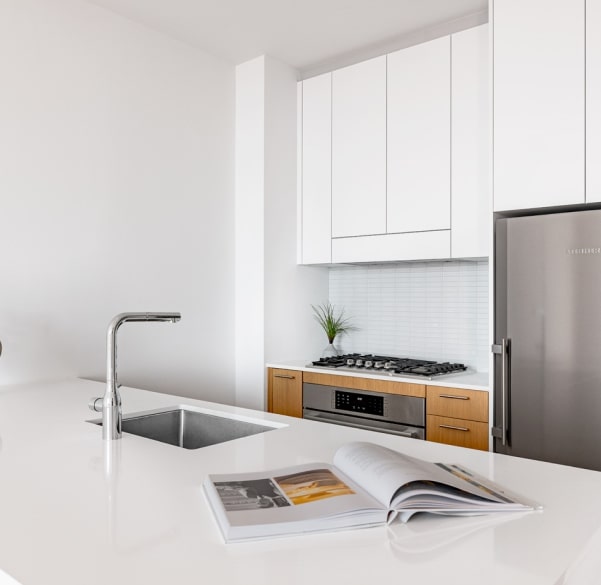 Subway tile backsplash and stainless-steel appliances